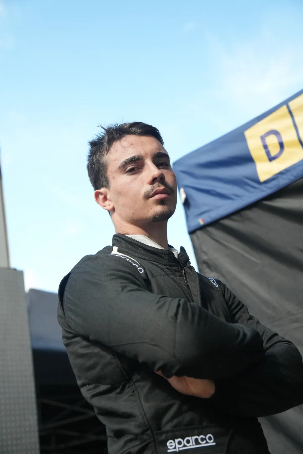 Gabriel in race suit